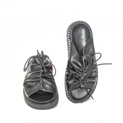 THE MONK’S SANDALS